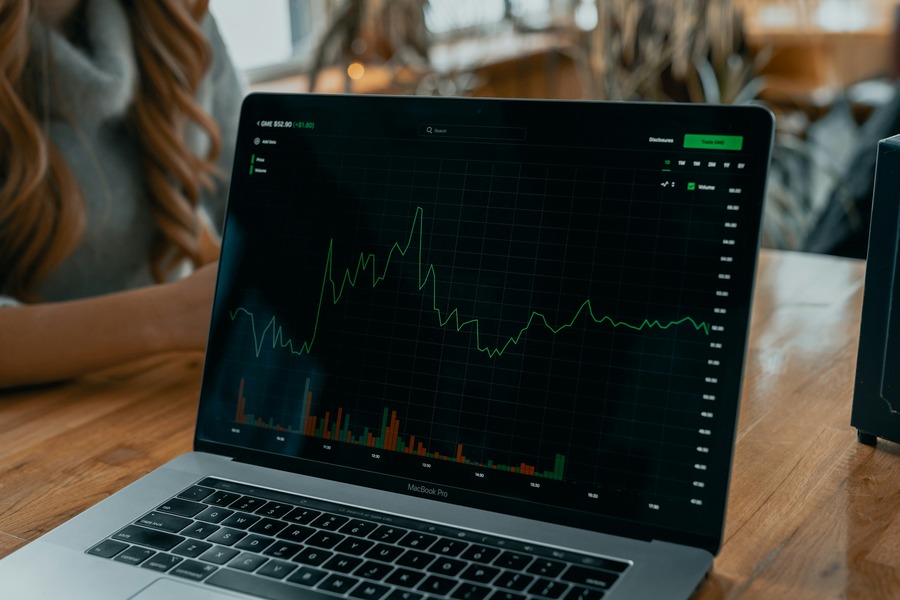 Laptop with trading chart